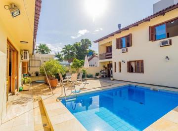 https:__pui.loft.com.br_listings_9096bbfb-91c0-4925-8d51-db0cba81aea5_photos_0ab2ded7?preset=desktop · Casa à venda em Vila Assunção com 392 m², 5 quartos, 2 suítes, 4 vagas