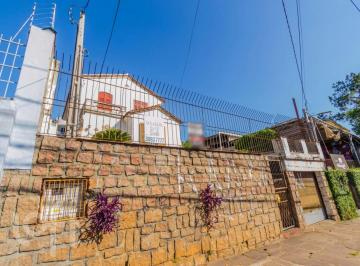 https:__pui.loft.com.br_listings_8c700dca-dc6e-48d2-8fe7-56035e180ab1_photos_f0e4e072?preset=desktop · Casa à venda em Nonoai com 319 m², 3 quartos, 1 vaga