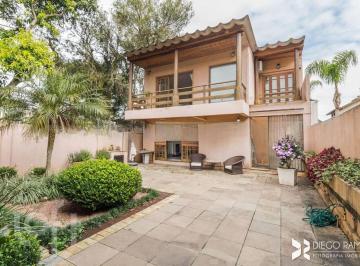 https:__pui.loft.com.br_listings_a2d53de8-59c2-4891-9e0d-88a73d40c73d_photos_cb16fd21?preset=desktop · Casa à venda em Tristeza com 374 m², 6 quartos, 1 suíte, 9 vagas