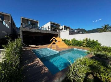 d12e36ff19604524573e90dc0a50892239fa0053 · Casa Terrea frente ao mar. Descrição: 4 suítes espaçosas, sala de estar ampla, cozinha moderna, áre