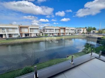 Casa · 148m² · 3 Quartos · 1 Vaga · LINDA CASA DE ESQUINA BEIRA LAGO COM 3 DORMITÓRIOS NO CONDOMÍNIO MURANO
