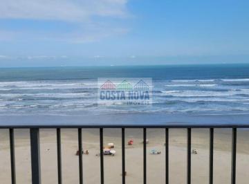 Apartamento · 80m² · 2 Quartos · 1 Vaga · Frente Mar na Praia Grande: Apartamento Mobiliado com Suíte e Vista Espetacular