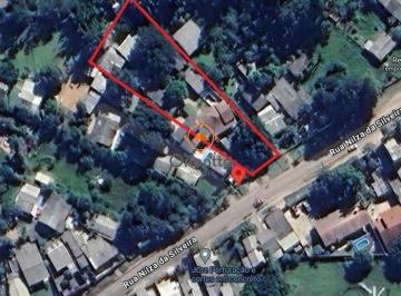 Terreno · 3780m² · 6 Quartos · 3 Vagas · Terreno no bairro Hípica com 3.780m² com 3 casas