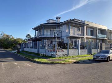 Foto 03 · Imóvel de Luxo: Casa com 3 quartos, 3 suítes e 259,85m² à venda em Canoas-RS, bairro Marechal Rondon