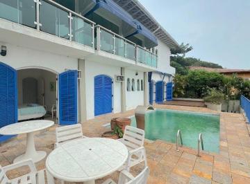 Casa · 350m² · 4 Quartos · 3 Vagas · Casa com Piscina e Vista Mar à Venda no Jardim Três Marias