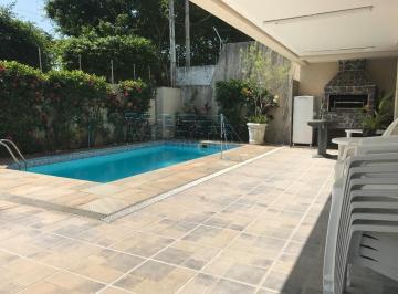Casa · 315m² · 5 Quartos · 4 Vagas · Casa beira mar com piscina à venda no Balneário Guarujá
