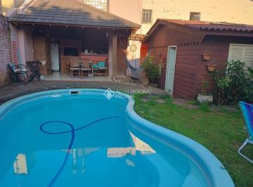 10 · casa com 4 quartos no centro de Dois Irmãos - RS