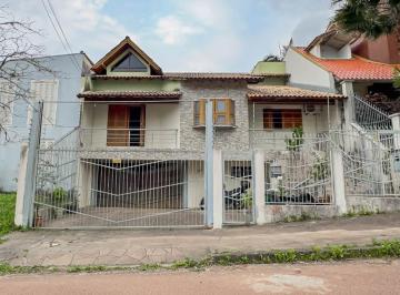 494422_i5IA6b2CR4h569IGW4x88_49442266df43adbf598.jpg · Casa de 3 quartos com 2 vagas de garagem à venda no bairro Jardim Itú em Porto Alegre