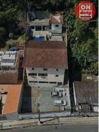 260cc734c1ff54d39586b0f4b61ba9d3c73b190d · Casa com 6 dormitórios à venda, 736 m² por R$ 1.410.000,00 - Morro dos Barbosas - São Vicente/SP