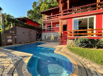 Foto 02 · Triplex de Luxo em Condomínio Exclusivo: 7 Quartos, 3 Suítes, Piscina Privativa e Vista para o Mar e