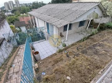 Casa · 150m² · 6 Quartos · 3 Vagas · Amplo terreno com 2 e 3 casas no Bairro Jardim Carvalho em Porto Alegre/RS. Excelente oportunidade p