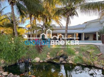 Foto 01 · Oásis de Luxo: Rancho de 7 Suítes no Condomínio Enseada Azul, Fronteira/MG - 800m², Piscina, Quadra