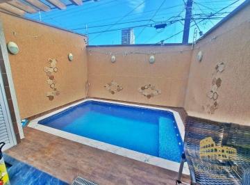 a60f2130be342f32de197868f27e4a59c71401b1 · Casa com 2 dormitórios à venda, 94 m² por R$ 700.000,00 - Vilamar - Praia Grande/SP