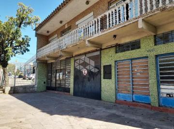 713596_iCL7F25o4563tzl5p_71359668d5571c10bcf.jpg · Prédio com 2 andares, térreo com 2 lojas e 1 andar 2 apartamentos na Av Cavalhada