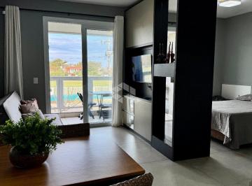 713778_ia29TN85_71377868d6adfd87d46.jpg · LOFT mobiliado, banheiro social, sacada com churrasqueira, totalizando 60,06m² no condomínio Fechado
