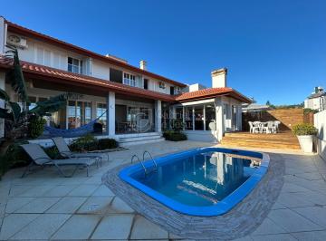 Casa · 358m² · 3 Quartos · 4 Vagas · Casa alto padrão com vista para o mar