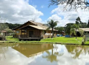 d575ed85392a2a1a2cc8f32374c1230860876e8b · Chácara/Sítio com 4 quartos, lago e área de cultivo à venda, 18.868 m² por R$ 1.150.000 - Zona Rural