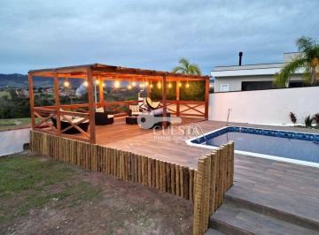 ad03d167804409f273dd49185792fa67e8b742cc · Casa com 3 dormitórios à venda, 242 m² por R$ 1.060.000,00 - Condomínio Ninho Verde II - Pardinho/SP