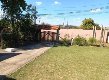 Área externa (garagem) · Chácara à venda no bairro Maria Vitória, em Dois Córregos/SP