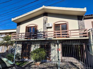 202509291524404789.jpg · Casa para Venda em Pelotas, Centro, 4 dormitórios, 1 suíte, 4 banheiros, 2 vagas