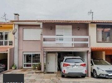 Casa · 240m² · 4 Quartos · 2 Vagas · Casa em condomínio no bairro Santo Antônio de 4 dormitórios e 2 vagas