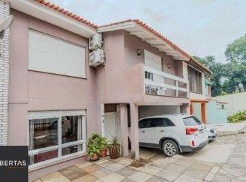 Casa · 240m² · 4 Quartos · 2 Vagas · Casa em condomínio no bairro Santo Antônio de 4 dormitórios e 2 vagas