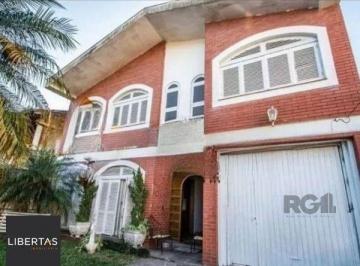 Comercial · 242m² · 4 Quartos · 3 Vagas · Casa sobrado no bairro Tristeza de 4 dormitórios 3 vagas para alugar