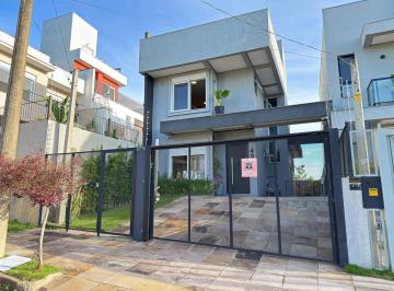 Casa · 198m² · 3 Quartos · 3 Vagas · Casa moderna com 3 dormitórios com pátio grande e vista para o Rio Guaíba!