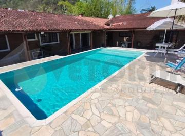 c4bc3c99ccab317eb871952cf6704382db2cc277 · Casa com 4 dormitórios à venda, 406 m² por R$ 980.000,00 - Massaguaçu - Caraguatatuba/SP