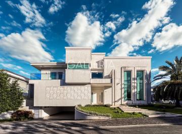 1 · Casa em condomínio mobiliada, 5 suítes, piscina e cinema no Jardim das Américas!