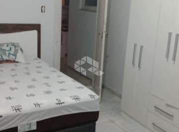 714369_ih6Ev8ZDZMyn_71436968dd8113e45c8.jpg · Casa com 2 dormitórios de esquina em Torres -RS