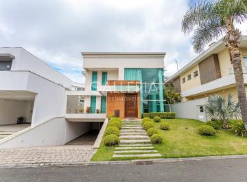 1 · Casa em condomínio com 3 suítes em Santa Felicidade.