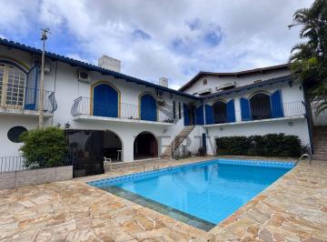 Área da piscina · ENCANTADORA CASA ESTILO AÇORIANO PORTUGUÊS EM CONDOMÍNIO FECHADO, NO CORAÇÃO DE BLUMENAU!