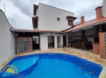 Foto 01 · Sobrado de luxo à venda em Itanhaém com 6 suítes, piscina aquecida, área gourmet e vista para o mar