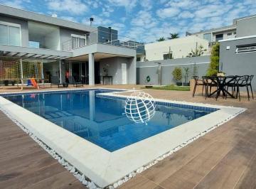 1e014d9df7e09dc601286c06b174f17420155996 · Casa com 4 dormitórios para alugar, 350 m² por R$ 21.389,00/mês - Condomínio Figueira Garden - Atiba