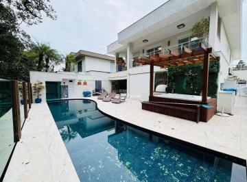22f14fe69aa99bcb99479fd0a75978fce7366382 · Casa com 6 dormitórios para alugar, 475 m² por R$ 7.500,00/dia - Riviera - Bertioga/SP