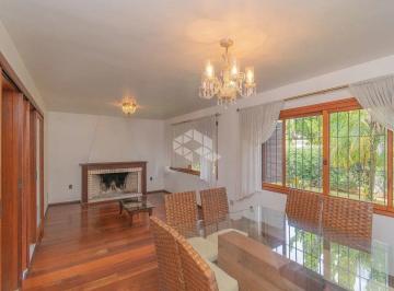 128851_iB276JDD2c845T4M4f_12885168e4138ee0784.jpg · Casa com 322m², 3 quartos, 3 suítes, 4 vagas, no bairro Três Figueiras em Porto Alegre
