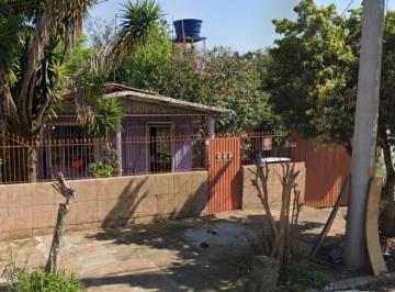 Foto 01 · Casa e terreno à venda em Esteio-RS, Bairro Olímpica: 2 quartos, 1 banheiro, 1 vaga de garagem, 110m