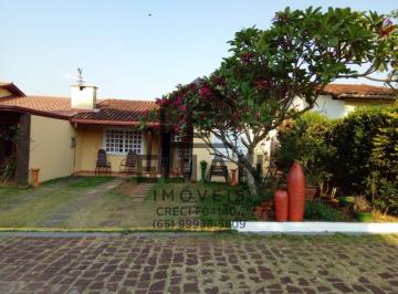Foto 01 · Venda  casa de condomínio   em Chapada dos Guimares  Só  R$  610.000,00 com três quartos sendo um de