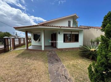 Casa · 211m² · 4 Quartos · 2 Vagas · Casa a 02 quadras da praia em Atlântida Sul.