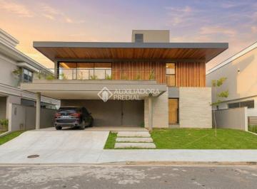 Casa · 375m² · 4 Quartos · 2 Vagas · Casa de alto padrão com 4 suítes em condomínio fechado - 375 m²