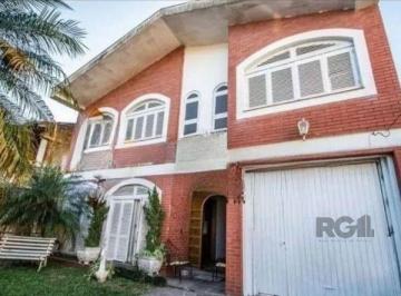 Casa · 242m² · 4 Quartos · 3 Vagas · Casa sobrado no bairro Tristeza de 4 dormitórios 3 vagas