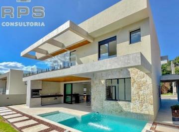 Foto 03 · Casa de alto padrão no Condomínio Reserva São Nicolau conta com 4 suítes, sendo uma no térreo, salas