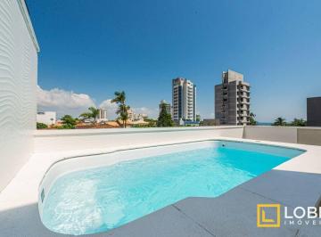 4ed9bd54579a57d7f3a2f6f62a181be3a3073ebb · Casa nova com 3 suítes e piscina à venda na cidade de Penha em SC