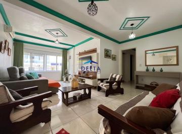 Sala de estar · Apartamento mobiliado 4 dormitorios com vaga á venda no Centro de Torres/RS
