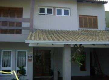01 - Fachada · Casa à venda de 3 quartos, 1 suíte e vaga para 4 carros no bairro Tristeza