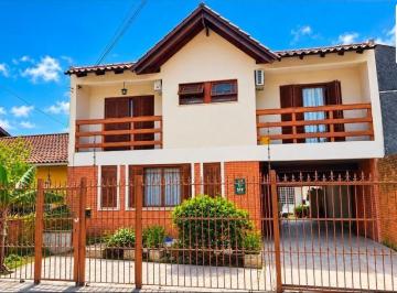 Casa · 243m² · 4 Quartos · 2 Vagas · Casa no bairro Nonoai - 4 dormitórios - 2 vagas