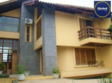 Casa · 371m² · 4 Quartos · 4 Vagas · Casa de 370m² - 4 dormitórios, 2 suítes e 4 vagas de garagem no bairro Espírito