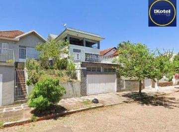 Casa · 168m² · 4 Quartos · 2 Vagas · Casa com 167m², 4 dormitórios, 2 suítes, 2 vagas no bairro Santa Tereza