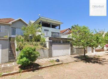Casa · 168m² · 4 Quartos · 2 Vagas · Casa com 167m², 4 dormitórios, 2 suítes, 2 vagas no bairro Santa Tereza